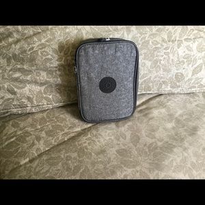 Kipling silver makeup pouch